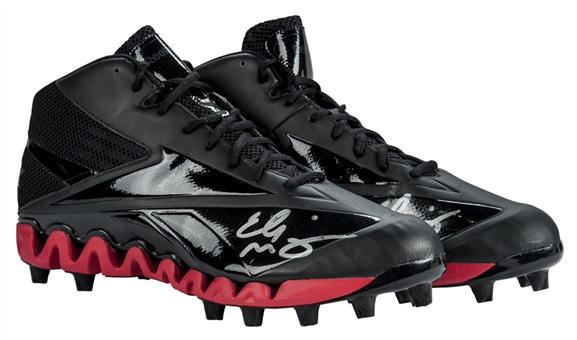 Eli Manning Game Issued and Signed Red and Black Cleats (Steiner/JSA LOA)
